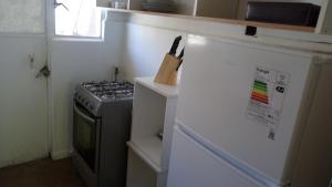A cozinha ou cozinha compacta de Apartamento Valparaiso