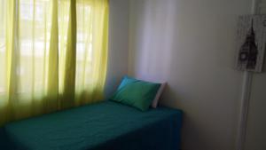 Cama ou camas em um quarto em Apartamento Valparaiso