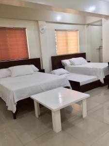 Cama o camas de una habitación en RESIDENCIA SAN VICENTE - PASAY -Budget Hotel