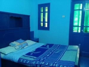 Postel nebo postele na pokoji v ubytování Oasis hotel