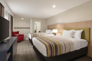 Легло или легла в стая в Country Inn & Suites by Radisson, Bakersfield, CA