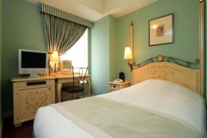 Cama o camas de una habitación en Hotel Monterey Lasoeur Ginza