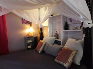 Cama o camas de una habitación en Muscade lodge