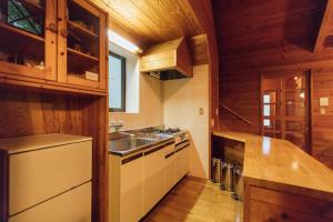 Kuchyň nebo kuchyňský kout v ubytování Izumigo AMBIENT Yatsugatake Cottage