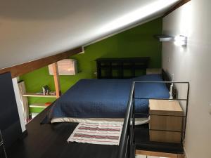 En eller flere senge i et værelse på Residenza Bolognino