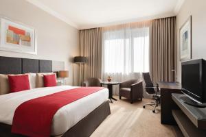 A television and/or entertainment centre at Ramada Downtown Abu Dhabi