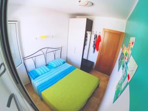 Ein Bett oder Betten in einem Zimmer der Unterkunft Con PISCINA e GARAGE a 300 m da spiaggia e centro