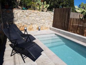 Der Swimmingpool an oder in der Nähe von Villa townhouse Calvario
