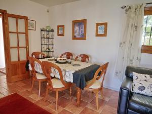 a dining room with a table and chairs at Villa Sophie - by Holiday Rentals Villamar in Benitachell