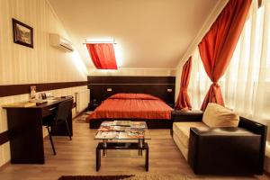 Postel nebo postele na pokoji v ubytování Viva Hotel