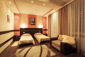 Postel nebo postele na pokoji v ubytování Viva Hotel + 37 fotografií