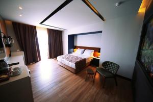 Кровать или кровати в номере Sey Beach Hotel & Spa