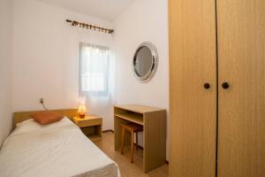 Posteľ alebo postele v izbe v ubytovaní Apartment Puh