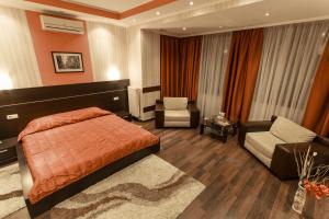 Postel nebo postele na pokoji v ubytování Viva Hotel