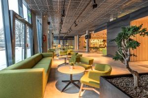 Uma área de estar em Urbihop Hotel