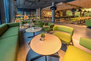 Uma área de estar em Urbihop Hotel