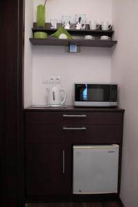 Kuchyňa alebo kuchynka v ubytovaní Glam House Apartments