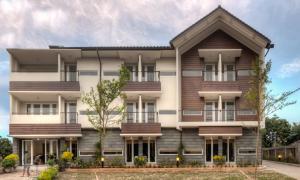 an exterior view of a building at Rumah Kamang Residence in Jakarta