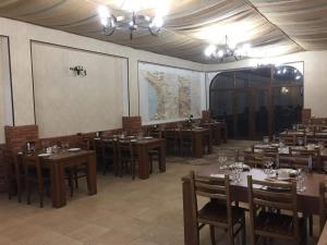 Un restaurant sau alt loc unde se poate mânca la Guest-House Mimino