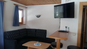 TV a/nebo společenská místnost v ubytování Gabershof