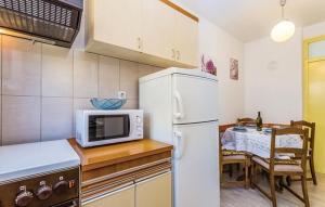 Kuchyň nebo kuchyňský kout v ubytování Apartments Zita