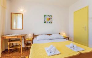 Postel nebo postele na pokoji v ubytování Apartments Zita