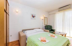 Postel nebo postele na pokoji v ubytování Apartments Zita