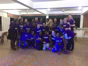 a group of people in purple shirts posing for a picture at Hans Cottage Botel in Cape Coast +76 photos