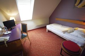 Voodi või voodid majutusasutuse Szent Gellért Hotel toas