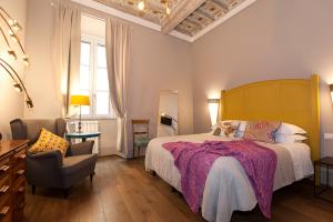 Posteľ alebo postele v izbe v ubytovaní Casa Fabbrini Fancy Suites