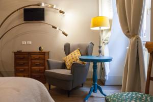 Posteľ alebo postele v izbe v ubytovaní Casa Fabbrini Fancy Suites