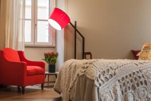 Posteľ alebo postele v izbe v ubytovaní Casa Fabbrini Fancy Suites