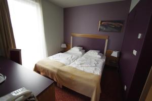 Voodi või voodid majutusasutuse Szent Gellért Hotel toas