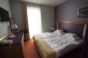Voodi või voodid majutusasutuse Szent Gellért Hotel toas