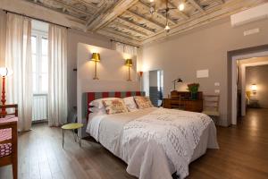 Posteľ alebo postele v izbe v ubytovaní Casa Fabbrini Fancy Suites