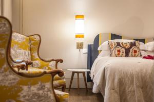 Posteľ alebo postele v izbe v ubytovaní Casa Fabbrini Fancy Suites