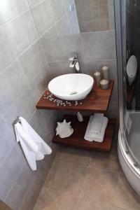 Kúpeľňa v ubytovaní Glam House Apartments