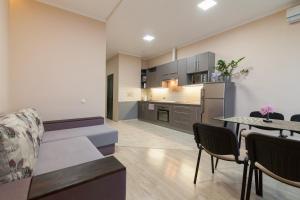 Kuchyň nebo kuchyňský kout v ubytování Lux Apart Lviv apartments