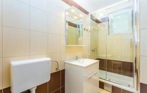 Koupelna v ubytování Apartments Zita
