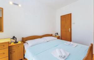 Postel nebo postele na pokoji v ubytování Apartments Zita