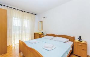 Postel nebo postele na pokoji v ubytování Apartments Zita
