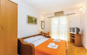 Postel nebo postele na pokoji v ubytování Apartments Zita
