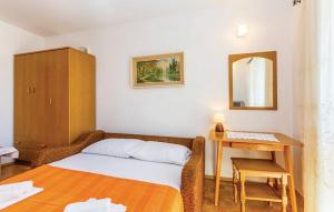 Postel nebo postele na pokoji v ubytování Apartments Zita