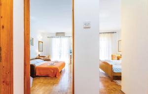 Postel nebo postele na pokoji v ubytování Apartments Zita