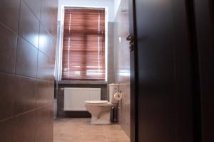 Kúpeľňa v ubytovaní Glam House Apartments