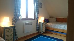 Giường trong phòng chung tại Maison independante de montagne en ALSACE +89 ảnh