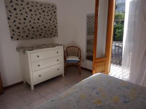 Postel nebo postele na pokoji v ubytování Claudia - case vacanze a Canneto spiaggia