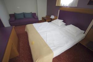 Voodi või voodid majutusasutuse Szent Gellért Hotel toas