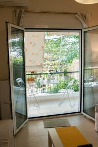 Μπαλκόνι ή βεράντα στο Cozy Bright Apartment