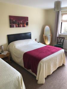 Voodi või voodid majutusasutuse Ard Eoinin Spiddal B&B toas